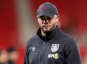 STOKE ON TRENT, ENGLAND - DECEMBER 30: Vincent Kompany, Manager of Burnley inspects the pitch prior to the Sky Bet Championship between Stoke City and Burnley at Bet365 Stadium on December 30, 2022 in Stoke on Trent, England. (Photo by Charlotte Tattersall/Getty Images)