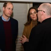 Prince William and Kate Middleton greet Pastor Mick Fleming at Church on the Street in Burnley.