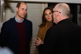 Prince William and Kate Middleton greet Pastor Mick Fleming at Church on the Street in Burnley.