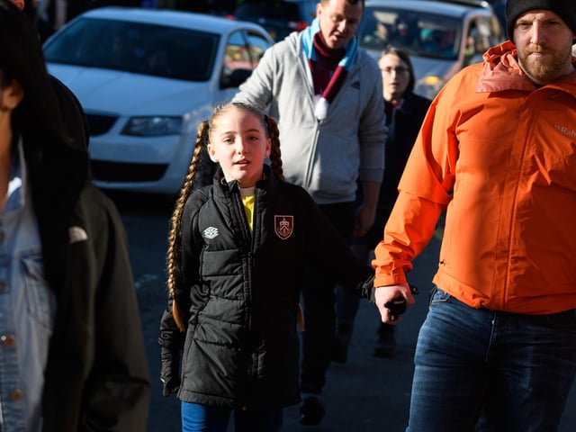 Burnley fans arrive at Turf Moor ahead of the Championship fixture with Blackburn Rovers which ended in a 3-0 victory for the Clarets. Photo: Kelvin Stuttard