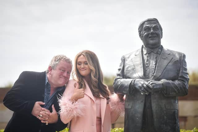 Jon Culshaw with Charlotte Dawson, Les' daughter, and his statue in St Annes