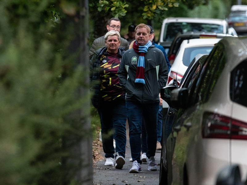 Burnley fans arrive at the Peninsula Stadium for the Carabao Cup tie with Salford City. Photo: Kelvin Lister-Stuttard