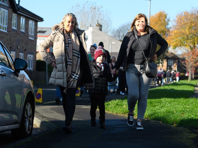 Burnley fans arrive at Turf Moor ahead of the Championship fixture with Blackburn Rovers which ended in a 3-0 victory for the Clarets. Photo: Kelvin Stuttard