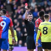 LONDON, ENGLAND - FEBRUARY 24: Referee, Lewis Smith shows a red card to Josh Brownhill of Burnley during the Premier League match between Crystal Palace and Burnley FC at Selhurst Park on February 24, 2024 in London, England. (Photo by Alex Davidson/Getty Images)