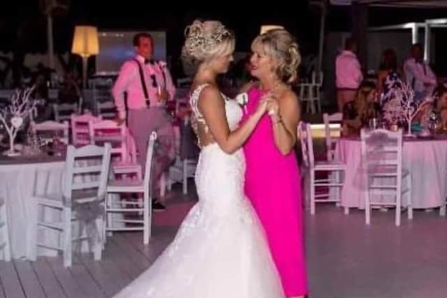 Suzi dances with daughter Danielle on her wedding day before she became ill