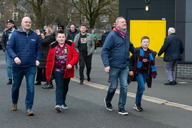 Burnley fans arrive at Turf Moor ahead of the local derby with Preston North End. Photo: Kelvin Stuttard