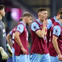 BURNLEY, ENGLAND - NOVEMBER 25: Dara O'Shea of Burnley looks dejected after the team's defeat in the Premier League match between Burnley FC and West Ham United at Turf Moor on November 25, 2023 in Burnley, England. (Photo by James Gill/Getty Images)