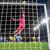 BRIGHTON, ENGLAND - DECEMBER 09: James Trafford of Burnley makes a save during the Premier League match between Brighton & Hove Albion and Burnley FC at American Express Community Stadium on December 09, 2023 in Brighton, England. (Photo by Mike Hewitt/Getty Images)