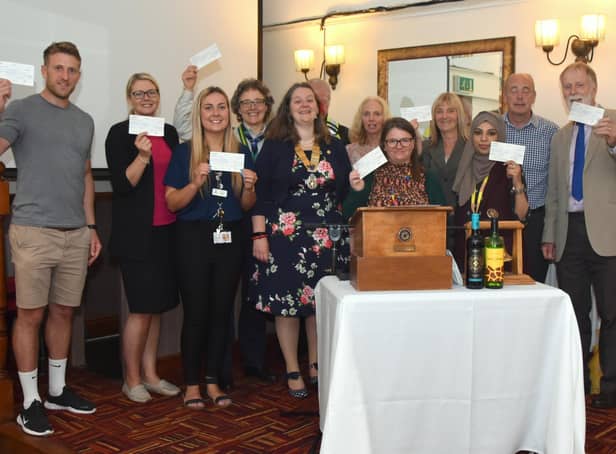 Representatives of some of the charities who received a donation from Clitheroe Rotary Club are pictured with their cheques