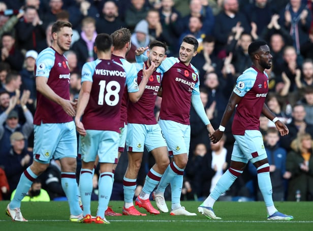 BURNLEY, ENGLAND - OCTOBER 30: Matthew Lowton of Burnley celebrates with teammates after scoring their team's second goal during the Premier League match between Burnley and Brentford at Turf Moor on October 30, 2021 in Burnley, England. (Photo by Jan Kruger/Getty Images)