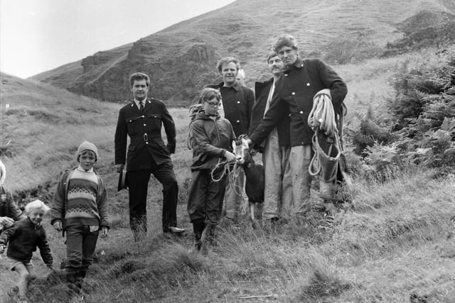 Coming down the mountain Fred holds the goat with Fireman Shorrock. Behind them are Leading Fireman Toms and Fireman Stacey. PC Osbaldeston is on the left.