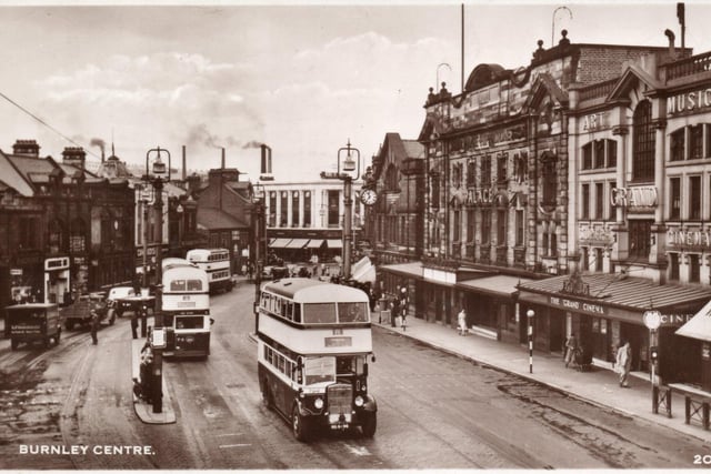 Burnley centre, showing the Bus Centre, with its famous clock, centre in the image, and Burton’s in the background.