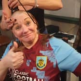 Burnley woman Pauline Smith having her head shaved in aid of Support After Suicide.