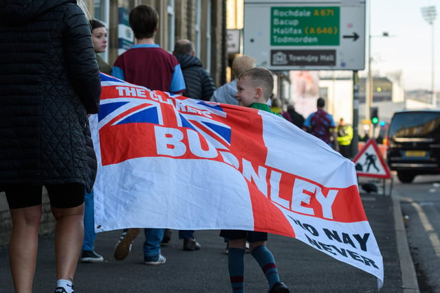Burnley fans arrive at Turf Moor ahead of the Championship fixture with Blackburn Rovers. Photo: Kelvin Stuttard