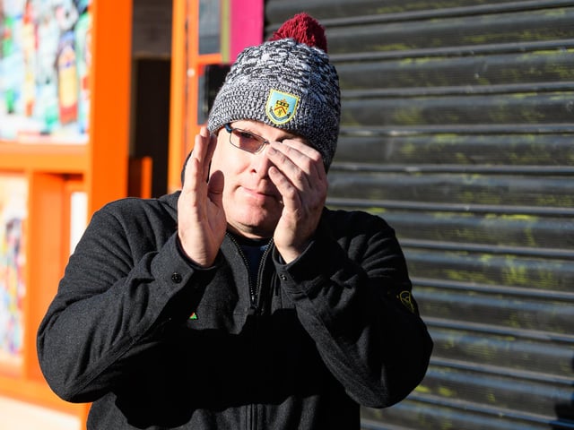 Burnley fans arrive at Turf Moor ahead of the Championship fixture with Blackburn Rovers which ended in a 3-0 victory for the Clarets. Photo: Kelvin Stuttard