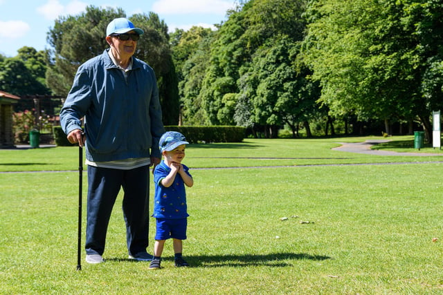 Reggie Tibbs (2) with great grandfather, Arthur Widdop in Thompson Park, Burnley. Photo: Kelvin Stuttard