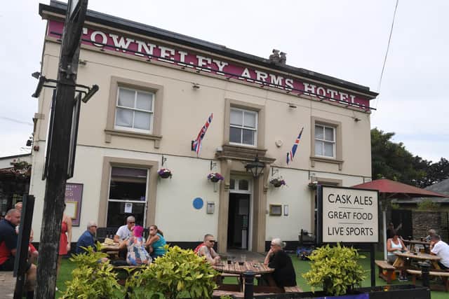 The Towneley Arms Hotel by the former railway station  has a blue plaque    Photo: Neil Cross