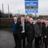 Pictured at the opening of the new car park extension at Burnley's Manchester Road railway station are (left to right) Simon Ashworth, car parks manager for Northern Trains, Owain Roberts, regional stakeholder manager for Northern Trains, Richard Watts, chair of Community Rail Lancashire, Mark Rawstron, board member of Lancashire Enterprise Partnership, Cllr Afrasiab Anwar, leader of Burnley Borough Council, Mike Cliffe, rail development manager for Lancashire County Council, County Councillor Aidy Riggott, cabinet member for economic development and growth for Lancashire County Council, Cllr Mark Townsend, executive member for economy and growth, Burnley Borough Council.