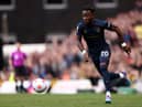 NORWICH, ENGLAND - APRIL 10: Maxwel Cornet of Burnley runs with the ball during the Premier League match between Norwich City and Burnley at Carrow Road on April 10, 2022 in Norwich, England. (Photo by Paul Harding/Getty Images)