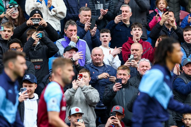 Burnley fans take videos on their phone as the teams take to the field

Photographer Alex Dodd/CameraSport

The Premier League - Burnley v Manchester City - Saturday 2nd April 2022 - Turf Moor - Burnley