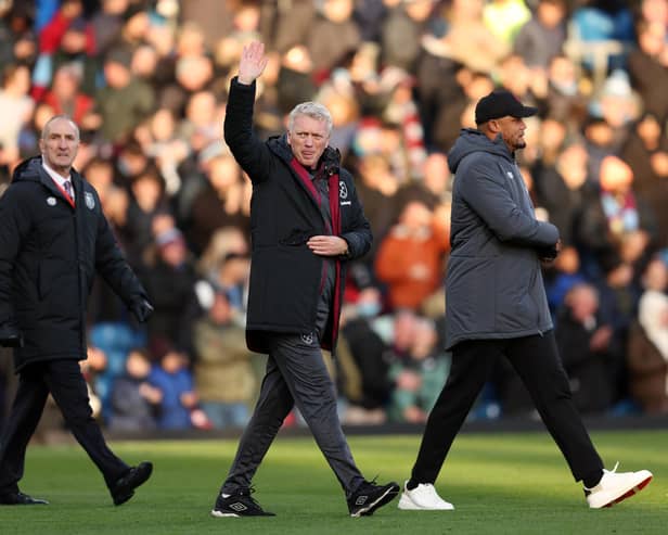BURNLEY, ENGLAND - NOVEMBER 25: David Moyes, Manager of West Ham United, acknowledges the fans alongside Vincent Kompany, Manager of Burnley, prior to the Premier League match between Burnley FC and West Ham United at Turf Moor on November 25, 2023 in Burnley, England. (Photo by Matt McNulty/Getty Images)