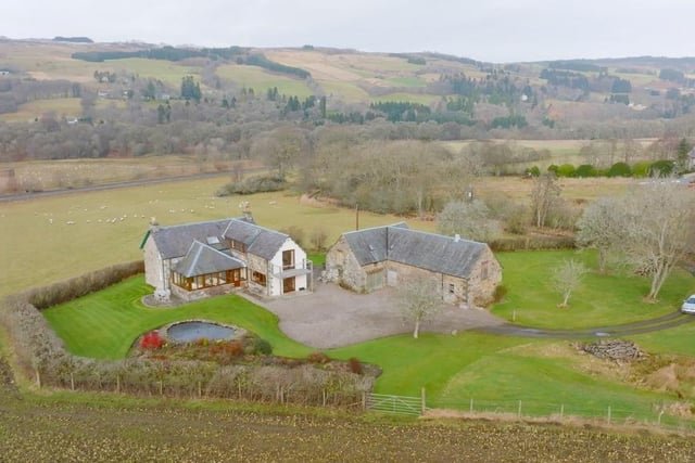 Aerial view of property showing surrounding countryside.