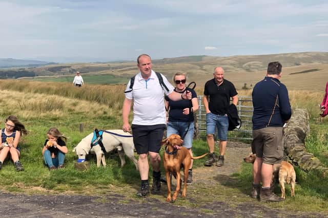 Several of the walkers and their dogs on the Scarlett's Stride walk (photo Matthew Pickles)