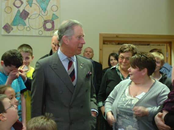 Prince Charles with Fran Monk during his visit at to the Fraser Street Project in Burnley
