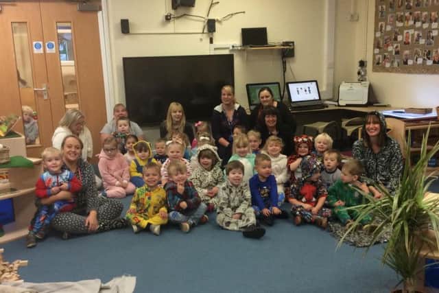 Children and staff from the morning session at Whitegate Children's Nursery in Padiham in their onesies and pjs for the RMCH (s)
