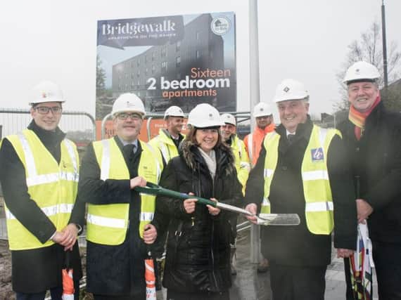 Pictured at the landmark sod cutting at the Bridge Walk Apartments are (left to right)  Nick Cumberland, Senior Area Manager for the HCA, Stuart Sage, Head of Area for HCA, Pam Smith, CEO of Burnley Council Tim Webber, MD of Barnfield Construction and Leader of Burnley Council Mark Townsend.