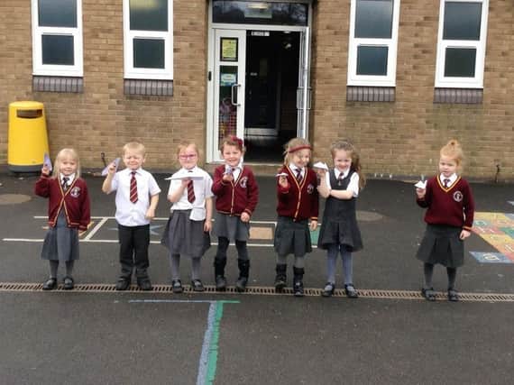 Youngsters at Wellfield Primary School in Burnley prepare to test out the paper planes they made during a Science and Technology Week.