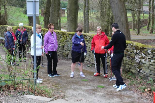 The 'Introduction to Golf' group prepare to play a few holes on Towneley's pitch and putt course