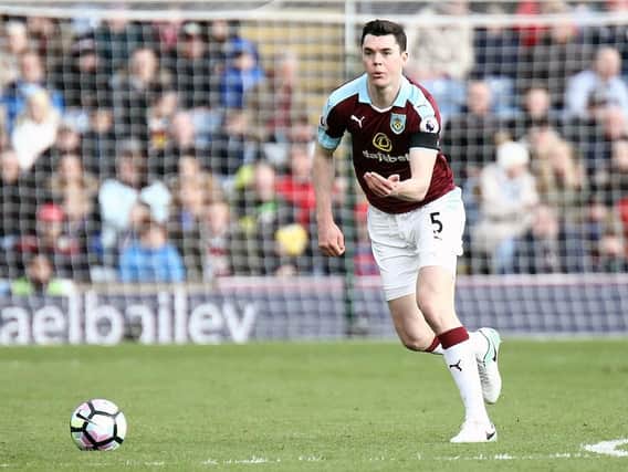 Michael Keane in action for the Clarets