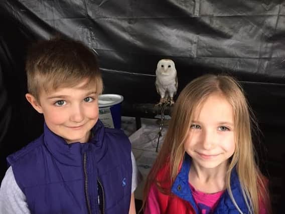 Theo and Freya Hosking complete with barn owl
