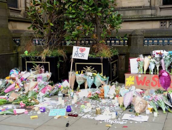 Floral tributes left outside Manchester Town Hall