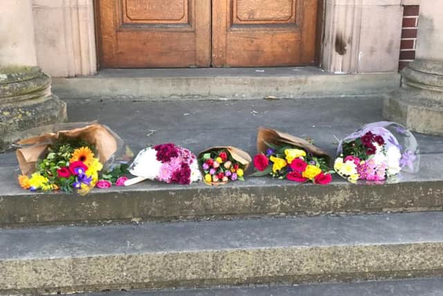 Floral tributes were placed on the steps of Padiham Town Hall during a peace vigil in honour of the Manchester Arena bomb  blast victims.