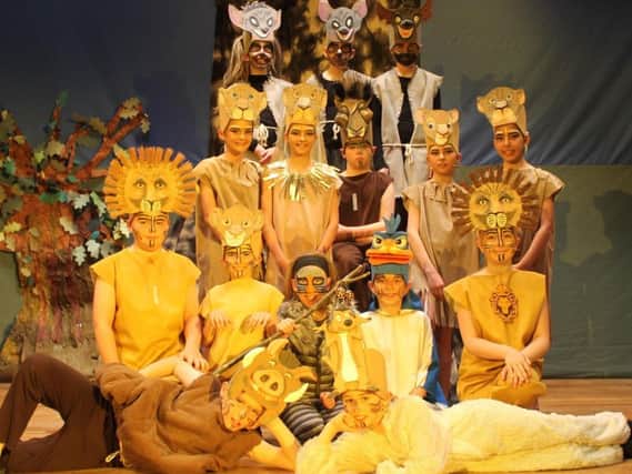 The cast of St Stephens CE Primary School, Burnley, in The Lion King. (s)