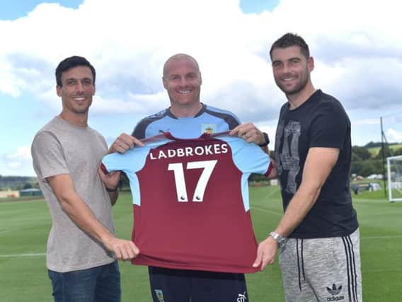 Burnley FC manager Sean Dyche with midfielder Jack Cork and forward Sam Vokes