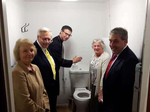 Bishop of Burnley, Phillip North, blessing a new toilet at Holy Trinity Church, Wray. (s)