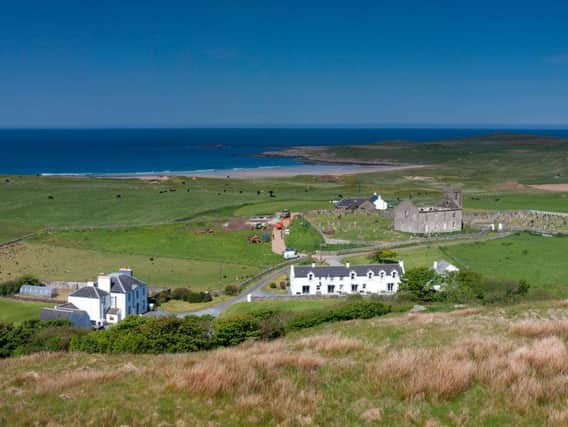 The Kilchoman Estate with Machir Bay in the distance.