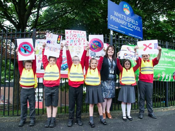 Whittlefield Primary School headteacher Mrs Helen Kershaw and some of her pupils who staged their own protest again inconsiderate parking in May this year.