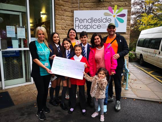 Pauline Roberts and her family with Jo Applegate (Fundraiser for Pendleside Hospice).