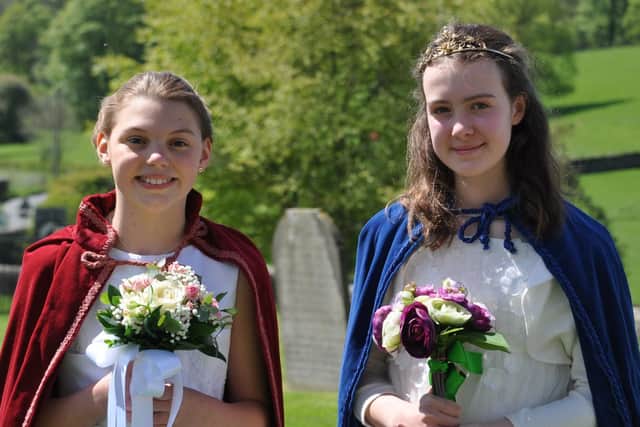 The new May Queen Sadie Wilson (left) with the retiring May Queen Madeleine Hayes.