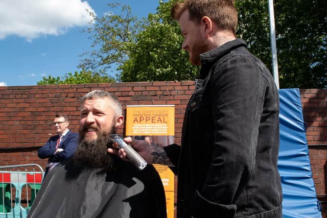 Simon Townley goes to work on Anthony's beard