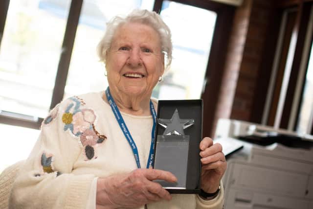 A thrilled Doris shows off her Star award