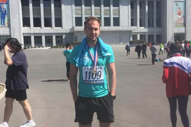 James Robbins after completing the Pyongyang Marathon in North Korea