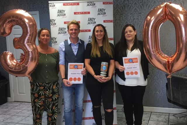 Andy Jackson celebrates 30 years at his Burnley hair salon with his daughter and fellow stylist Joelle (third from left) and stylists Lisa Broxup and Gemma Tonkinson .