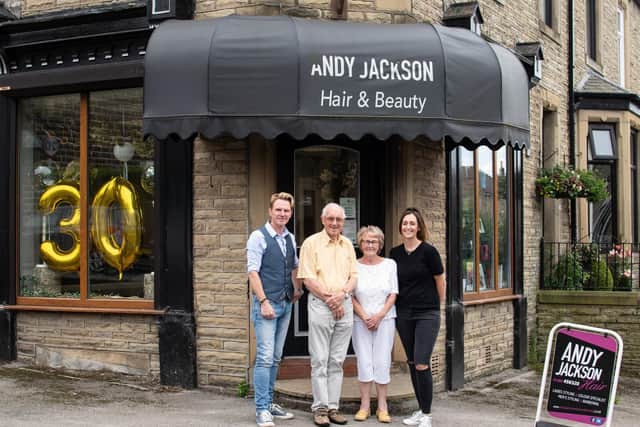 Andy outside his salon with his parents, Ken and Margaret and daughter Joelle.