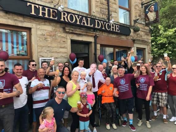 Regulars raise a glass outside The Royal Dyche (s)