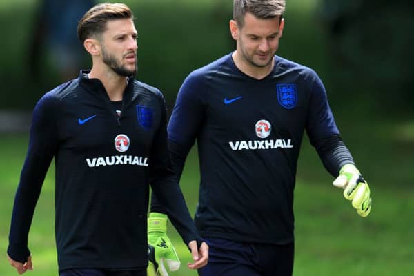 England's Adam Lallana (left) and Tom Heaton during a training session at The Grove Hotel, London. PRESS ASSOCIATION Photo. Picture date: Friday June 1, 2018. See PA story SOCCER England. Photo credit should read: Mike Egerton/PA Wire. RESTRICTIONS: Use subject to FA restrictions. Editorial use only. Commercial use only with prior written consent of the FA. No editing except cropping.